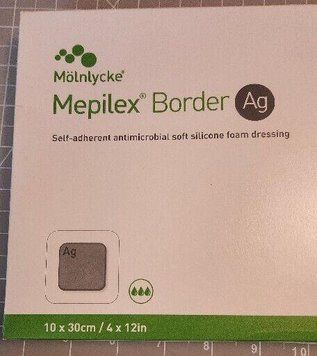 Мепилекс Бордер Аг Mepilex Border Ag 4x12 (10 x 30 см) &mdash; сорбционная повязка с окантовкой и серебром (1 шт.) MepilexBorderAg4x12 фото